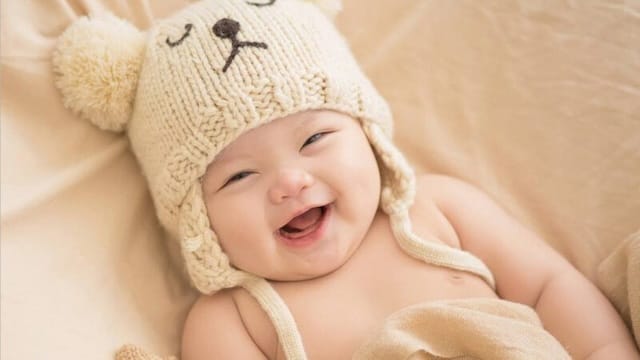 Mơ thấy bé trai đang cười cho thấy những chuyển biến tích cực trong cuộc sống